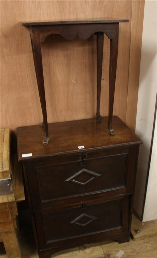 An oak cupboard and a small side table